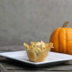 Mini Pumpkin Pie Tarts have a crispy phyllo shell and a no-bake pumpkin cream cheese filling perfect for the holiday season.