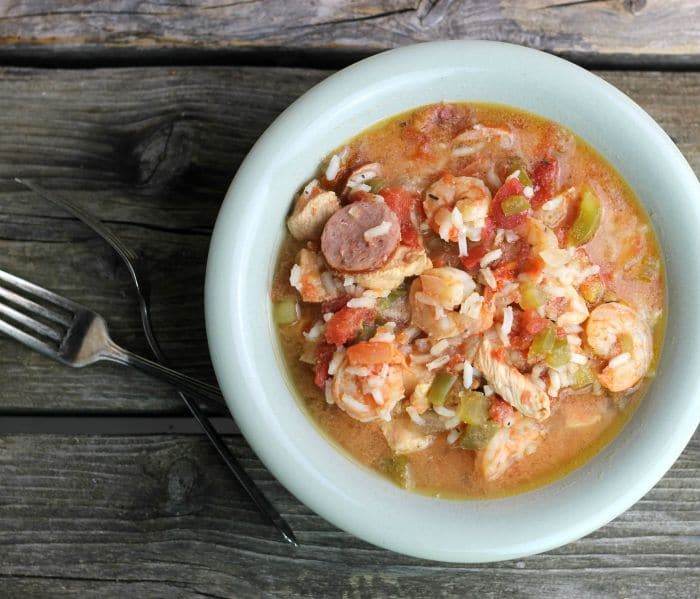 Easy Slow Cooker Gumbo is super easy to make in the slow cooker and is loaded with chicken, sausage, and shrimp and spices; and a real crowd pleaser.