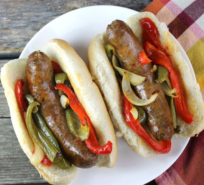Baked Italian Sausage and Peppers all baked together on a baking sheet, it is ready in under an hour and is perfect for any day of the week.