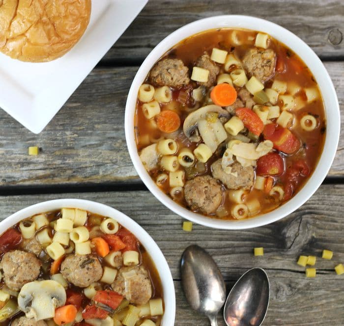 Italian Meatball Soup a hearty soup filled with fun little Italian sausage meatballs, veggies, pasta, and a ton of flavor, the perfect comfort food for this time of year.