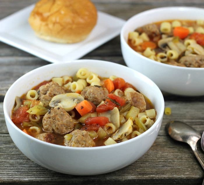 Italian Meatball Soup a hearty soup filled with fun little Italian sausage meatballs, veggies, pasta, and a ton of flavor, the perfect comfort food for this time of year.