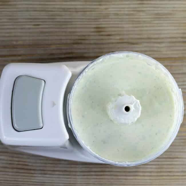 Savory cream cheese spread in a mini food processor.