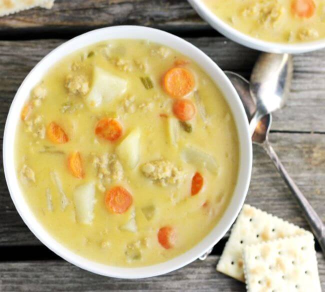 Overlooking a bowl of cheesy chicken chowder.