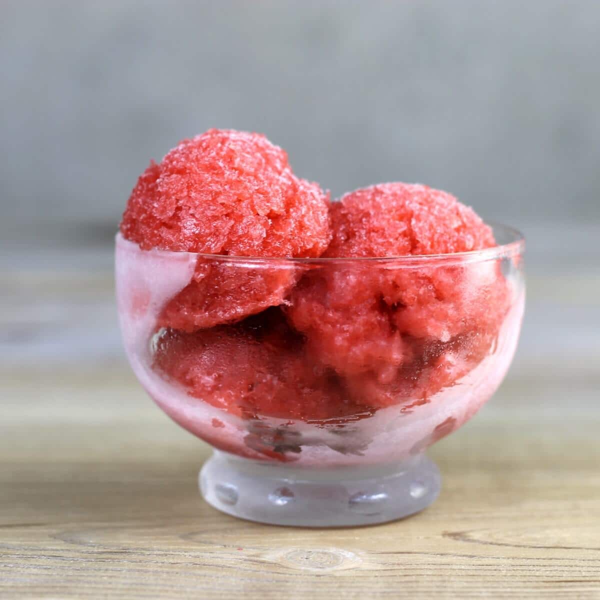 A side angle view of a bowl of sorbet.