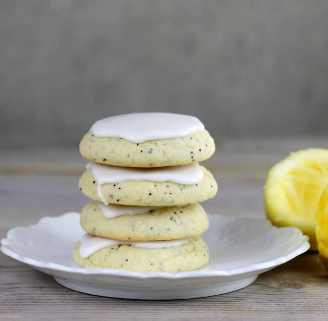 A pile of cookies on a white plate. 