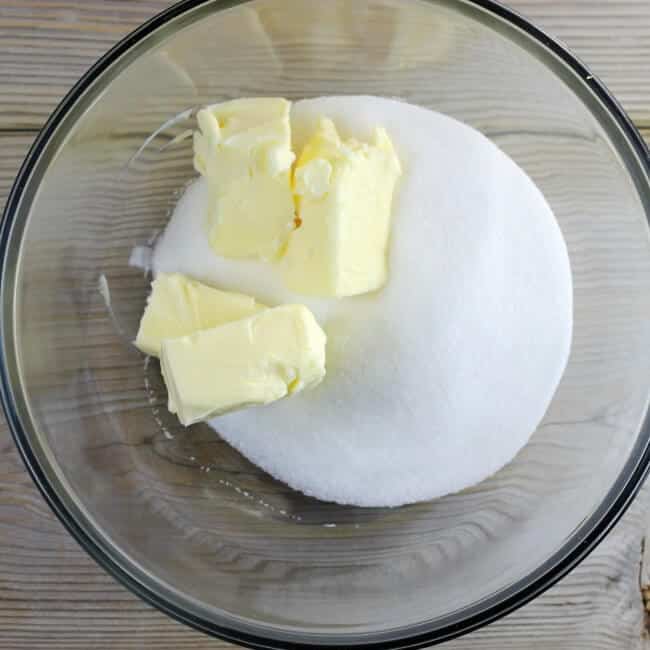 Butter and sugar added to a large mixing bowl.