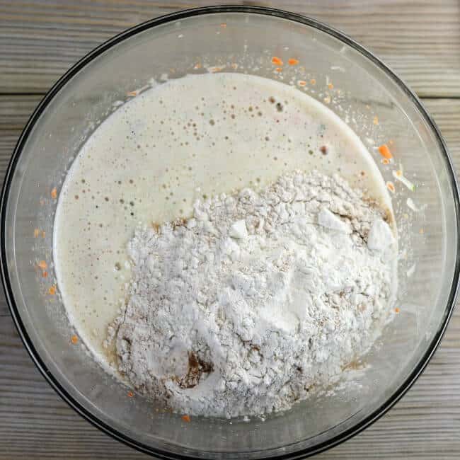 The flour mixture is added to the wet ingredients.