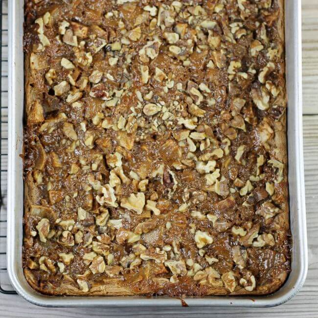 Baked caramel apple spice bars in a cake pan.