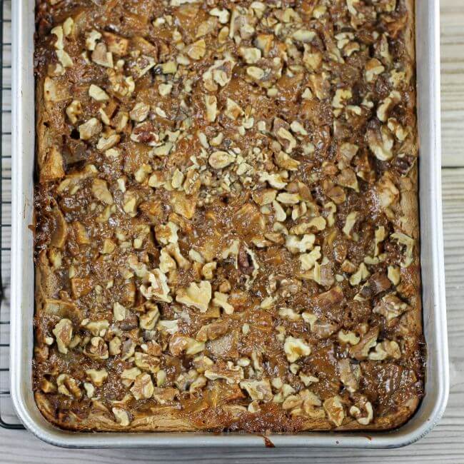 Baked caramel apple spice bars in a cake pan.