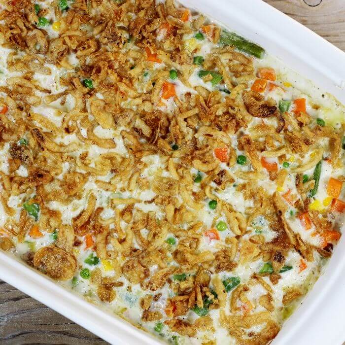 Baked casserole in a white baking dish.
