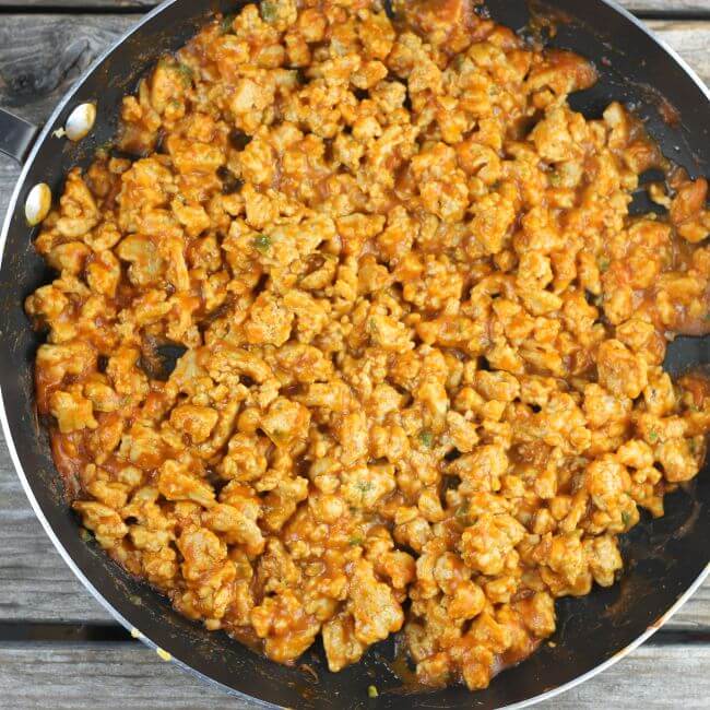 Ground taco chicken meat in a skillet