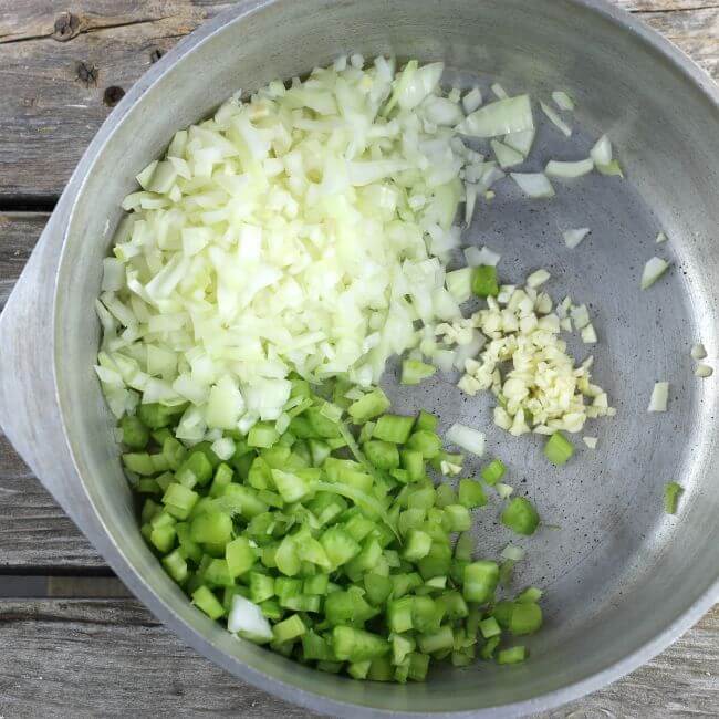 Celery, onion, and garlic in a Dutch oven.