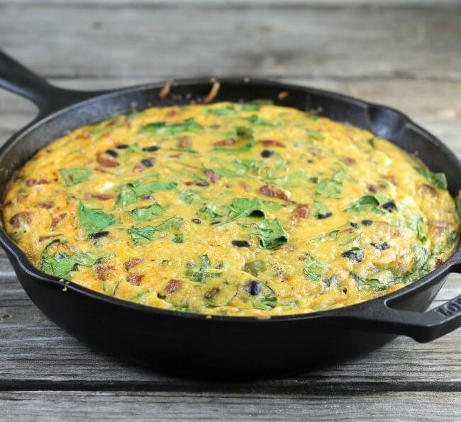 Baked chorizo frittata in a cast-iron skillet.