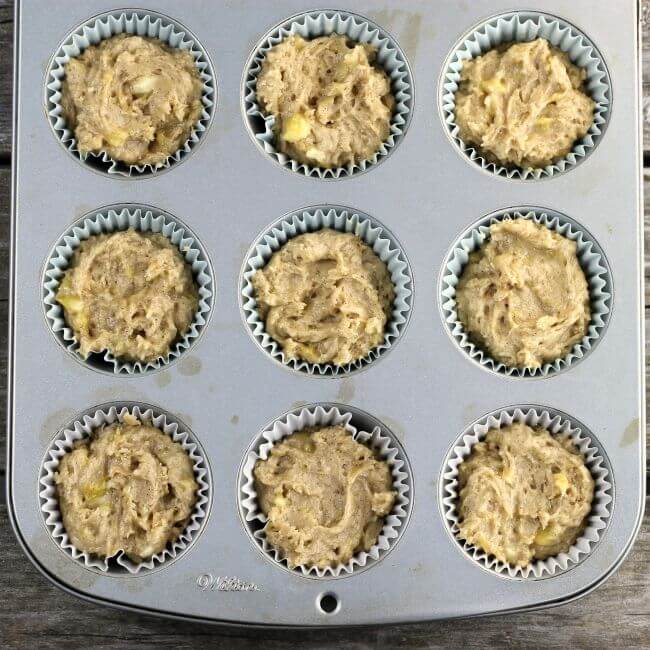 Muffin batter placed in the muffin tins.