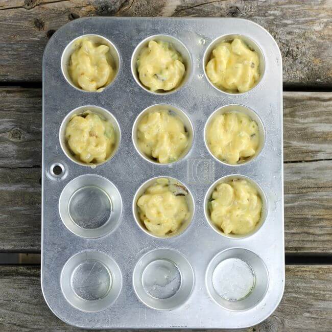 Macaroni and cheese in mini muffin tin.