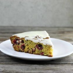 A piece of cake on a white plate.