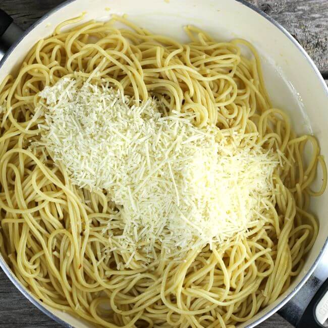 Add the Parmesan cheese to the pasta.
