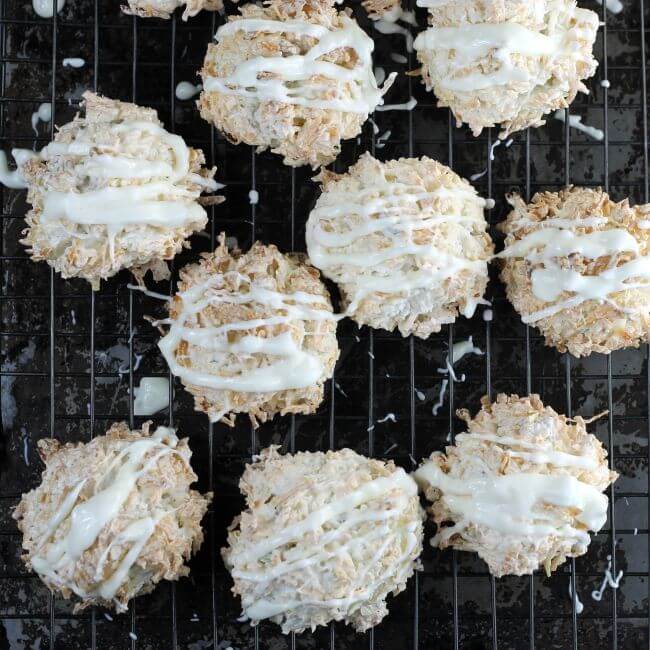 Melt white chocolate drizzled over top of macaroons.
