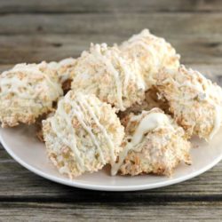 Side view of a plateful of macaroons.