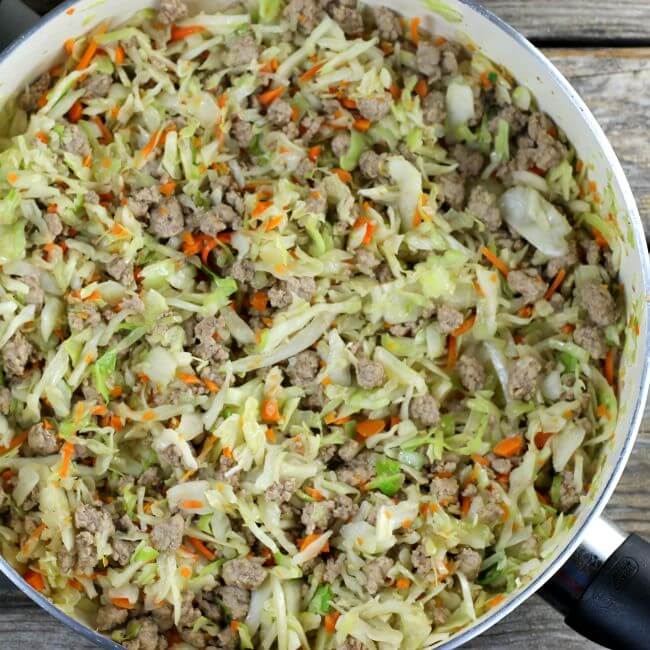 Pork and cabbage in the skillet.