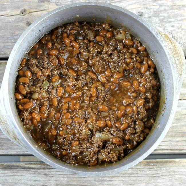 Beans are stirred into the hamburger.