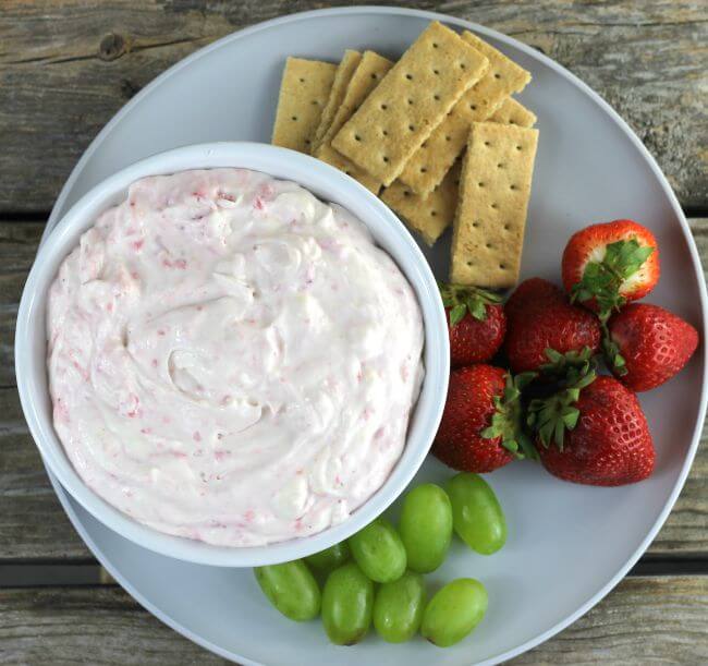 Looking down at a bowlful of cheesecake dip.