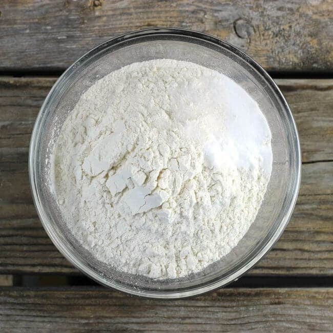 Flour, salt, and baking soda in a small bowl.