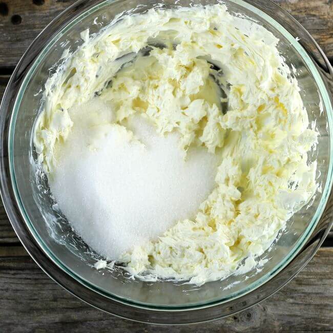 Sugar is added to the cream cheese.