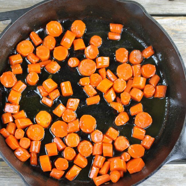 Glazed carrots in a skillet.