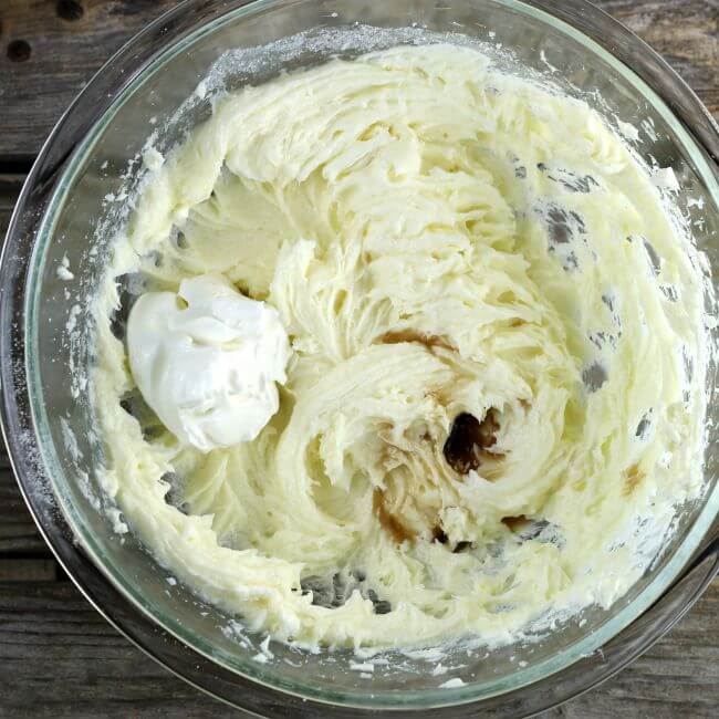 Add the sour cream cheese and vanilla to the cream cheese.