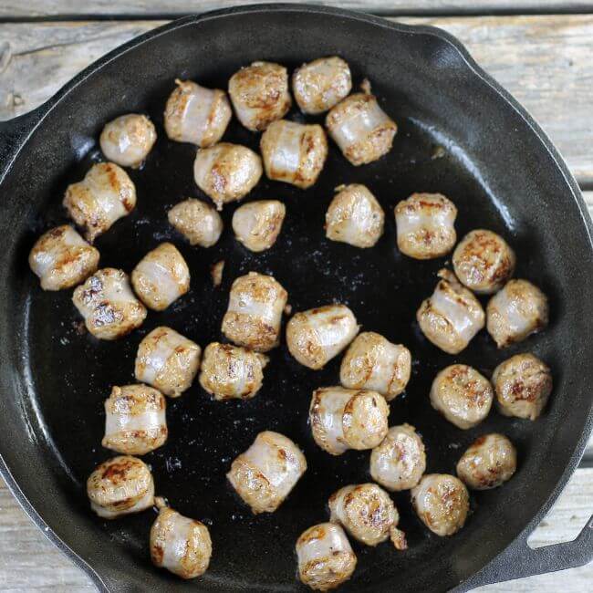 Italian sausage is browned in a skillet.