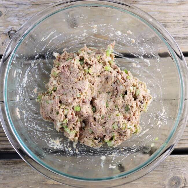 Tuna mixture in a mixing bowl.