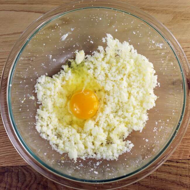 An egg is added to the batter.