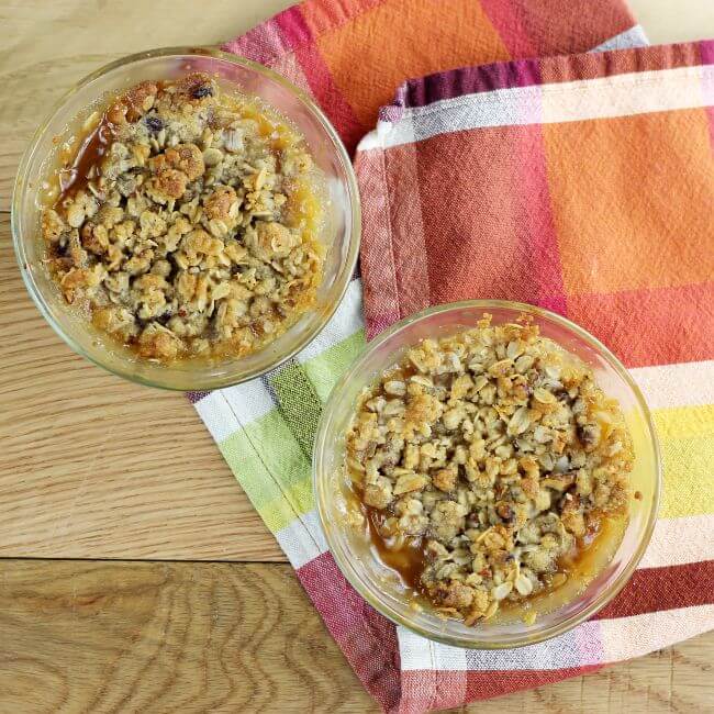 Looking down at two of rhubarb crisp.