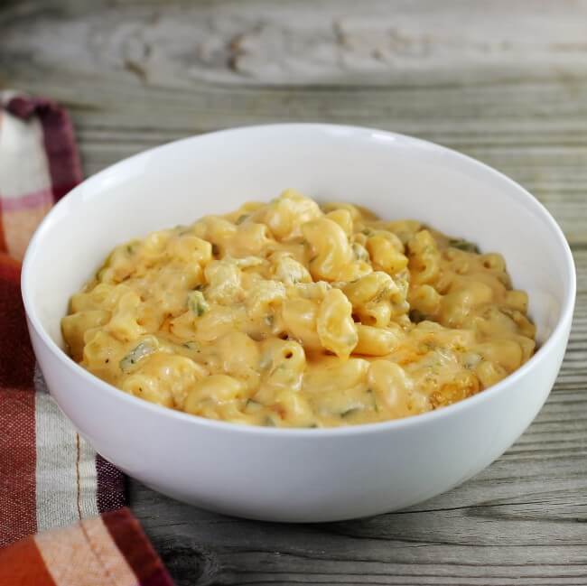 A white bowl with jalapeno mac and cheese.