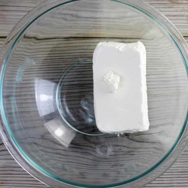 Overview of a bowl with cream cheese in it.