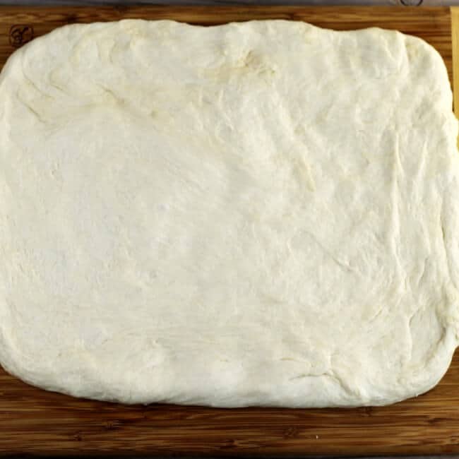 The dough is roll out into a rectangle.