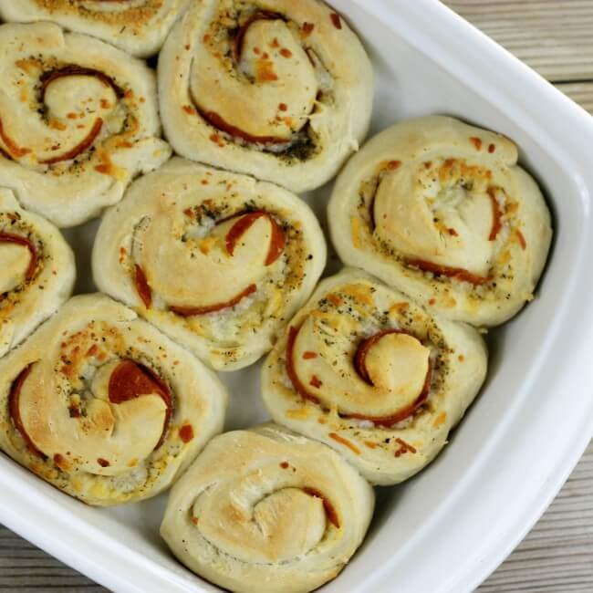 Baked pepperoni rolls in a baking pan. 