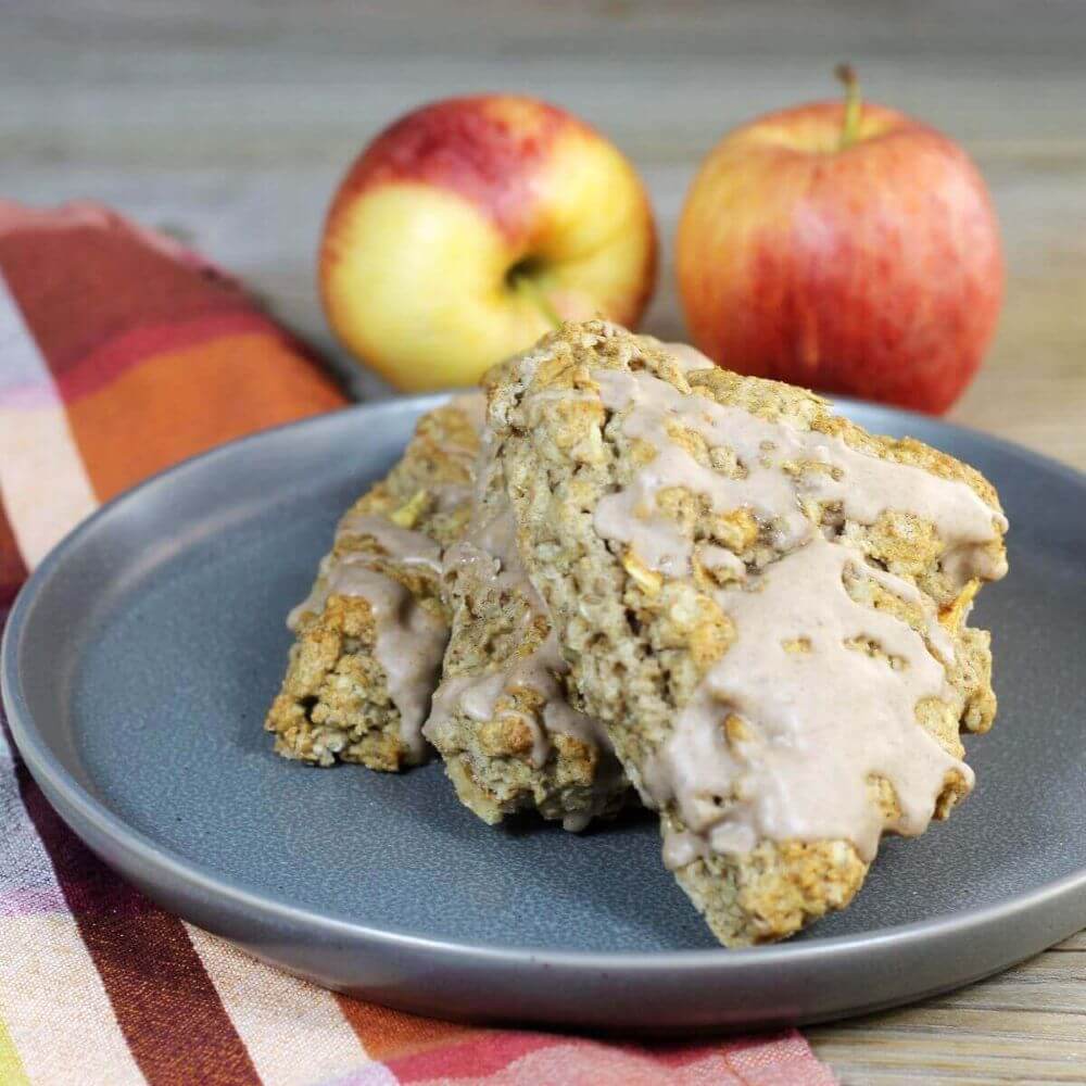 A front angle picture of scones on a gray plate.